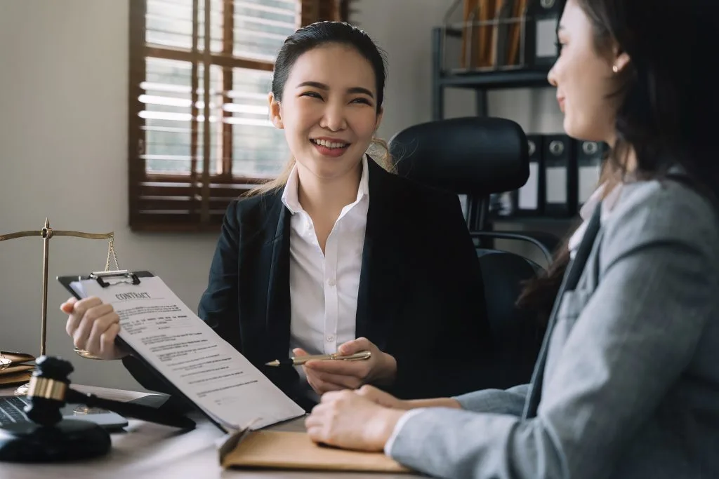 Close up businessman or Lawyer signing contract making a deal c